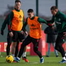 Jonny Evans, Dan Gore, Rhys Bennett of Manchester United in action during a first team training session at Carrington Training Ground on December 21, 2023 in Manchester, England.