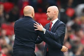  Erik ten Hag, then Manager of Manchester United, interacts with Arne Slot, Manager of Liverpool, after the Premier League match between Manchester United FC and Liverpool FC at Old Trafford on September 01, 2024 in Manchester, England.