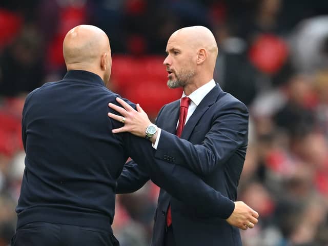  Erik ten Hag, then Manager of Manchester United, interacts with Arne Slot, Manager of Liverpool, after the Premier League match between Manchester United FC and Liverpool FC at Old Trafford on September 01, 2024 in Manchester, England.