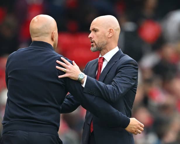  Erik ten Hag, then Manager of Manchester United, interacts with Arne Slot, Manager of Liverpool, after the Premier League match between Manchester United FC and Liverpool FC at Old Trafford on September 01, 2024 in Manchester, England.