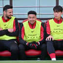 FC Seoul's forward Jesse Lingard (C) reacts from the team bench prior to the South Korean K-League football match between FC Seoul and Incheon United FC at Seoul World Cup Stadium in Seoul on March 10, 2024.