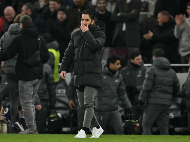 Manchester United's Portuguese head coach Ruben Amorim reacts on the pitch after the English Premier League football match between Tottenham Hotspur and Manchester United at the Tottenham Hotspur Stadium in London, on February 16, 2025. Tottenham won the game 1-0.