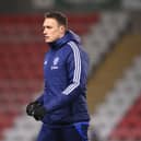 Phil Jones, Academy Coach of Manchester United looks on prior to the The FA Youth Cup 5th Round match between Manchester United and Chelsea  at Leigh Sports Village on February 12, 2025 in Leigh, England.