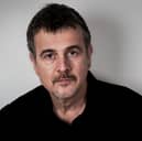 Mark Billingham has recalled the moment when his own life became like one of his crime novels during a trip to Manchester.