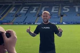 Photo of Matthew getting his photo taken in a Premier League football stadium