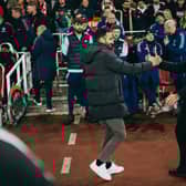 Ruben Amorim, Manager of Manchester United interacts with Mikel Arteta, Manager of Arsenal prior to the Premier League match between Arsenal FC and Manchester United FC at Emirates Stadium on December 04, 2024 in London, England. 