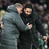 Ange Postecoglou, Manager of Tottenham Hotspur, and Ruben Amorim, Manager of Manchester United, embrace at full-time following the Premier League match between Tottenham Hotspur FC and Manchester United FC at Tottenham Hotspur Stadium on February 16, 2025 in London, England. 