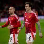 Christian Eriksen  and Victor Lindelof of Manchester United walk off the pitch after the Premier League match between Manchester United FC and Ipswich Town FC at Old Trafford on February 26, 2025 in Manchester, England.