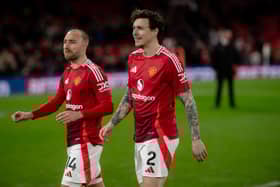 Christian Eriksen  and Victor Lindelof of Manchester United walk off the pitch after the Premier League match between Manchester United FC and Ipswich Town FC at Old Trafford on February 26, 2025 in Manchester, England.