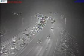 M61 traffic stopped after a coach caught fire