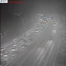 M61 traffic stopped after a coach caught fire