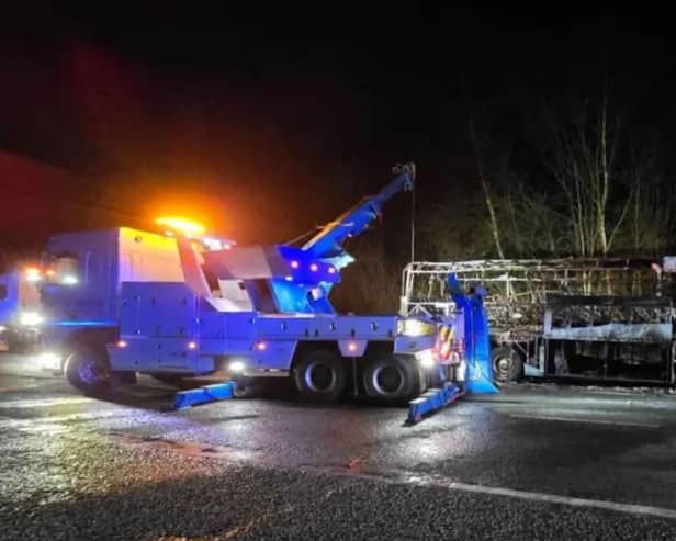 The coach was carrying more than 30 children as well as teachers when it caught fire on an M60 slip road
