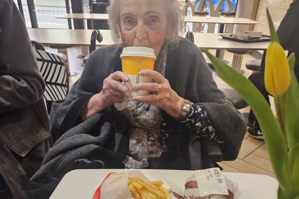 95-year-old Betty Timmis with her first ever McDonald's meal. 