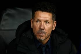 Atletico Madrid's Argentine coach Diego Simeone is pictured before the UEFA Champions League Round of 16 first leg football match between Real Madrid CF and Club Atletico de Madrid at the Santiago Bernabeu stadium in Madrid, on March 4, 2025. (Photo by Pierre-Philippe MARCOU / AFP) (Photo by PIERRE-PHILIPPE MARCOU/AFP via Getty Images)          