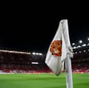 A general view of a Manchester United corner flag on the pitch ahead of the UEFA Europa League 2024/25 League Phase MD7 match between Manchester United and Rangers FC at Old Trafford on January 23, 2025 in Manchester, England.