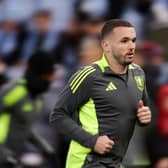 John McGinn of Aston Villa warms up prior to the UEFA Champions League 2024/25 Round of 16 Second Leg match between Aston Villa FC and Club Brugge KV at Villa Park on March 12, 2025 in Birmingham, England. 