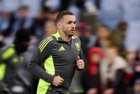 John McGinn of Aston Villa warms up prior to the UEFA Champions League 2024/25 Round of 16 Second Leg match between Aston Villa FC and Club Brugge KV at Villa Park on March 12, 2025 in Birmingham, England. 