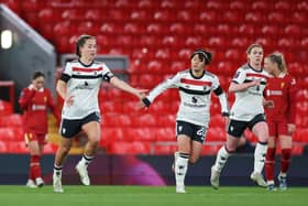 Maya Le Tissier of Manchester United celebrates scoring his team's first goal with team mate Hinata Miyazawa during the Barclays Women's Super League match between Liverpool FC and Manchester Untied at Anfield on March 14, 2025 in Liverpool, England.  