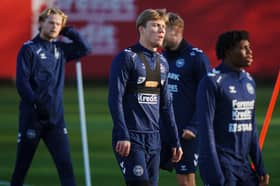 Denmark's forward Rasmus Hojlund (C) and his teammates attend a training session on the eve of the UEFA Nations League quarter-final, first-leg, football match Denmark v Portugal in Helsingor on March 19, 2025. 