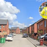 A family has been left “shaken” after a firearms discharge shattered the windows of their home in Manchester