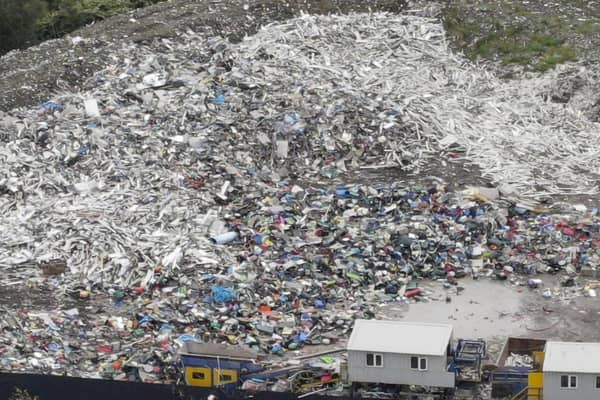 A drone picture shows huge piles of waste close to the Pioneer Mill site in Radcliffe