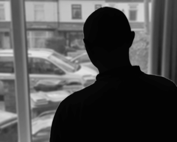 Silhouette of male domestic abuse victim who has opened up about his experience