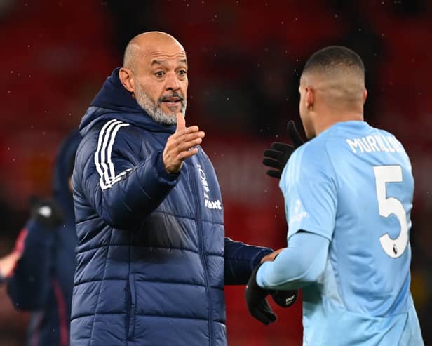 Nuno Espirito Santo, Manager of Nottingham Forest, celebrates victory with Murillo of Nottingham Forest after the Premier League match between Manchester United FC and Nottingham Forest FC at Old Trafford on December 07, 2024 in Manchester, England. 