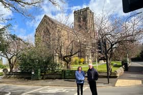 Jackie Campbell and Rev David Murray on the controversial stretch of road outside St Margaret's Church in Altrincham