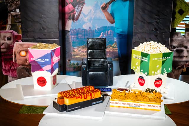 The Minecraft-style cakes, including turning popcorn, hot dogs, a drinks cup, nachos, and even a plush recliner seat