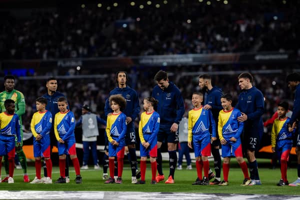 Bruno Fernandes, Andre Onana, Casemiro, Diogo Dalot, Leny Yoro, Noussair Mazraoui, Manuel Ugarte, Patrick Chinazaekpere Dorgu, Rasmus Hojlund of Manchester United line up ahead of the UEFA Europa League 2024/25 Quarter Final First Leg match between Olympique Lyonnais and Manchester United at OL Stadium on April 10, 2025 in Decines-Charpieu, France.