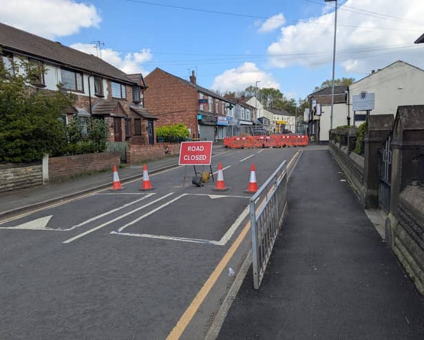 Whittaker Lane in Prestwich is closed after a sinkhole opened up