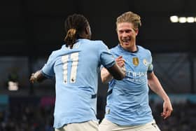 Kevin De Bruyne of Manchester City celebrates scoring his team's first goal with teammate Jeremy Doku during the Premier League match between Manchester City FC and Wolverhampton Wanderers FC at Etihad Stadium on May 02, 2025 in Manchester, England. 