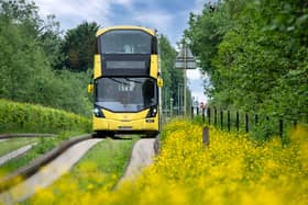 A Bee Network V1 bus going down the Leigh Guided Busway