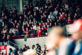 Manchester United fans watch from the stand during the Premier League match between Brentford FC and Manchester United FC at Brentford Community Stadium on May 04, 2025 in Brentford, England