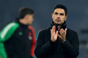 Mikel Arteta, Manager of Arsenal, applauds the fans at full-time following the team's defeat and subsequent elimination after the UEFA Champions League 2024/25 Semi Final Second Leg match between Paris Saint-Germain and Arsenal FC at Parc des Princes on May 07, 2025 in Paris, France.