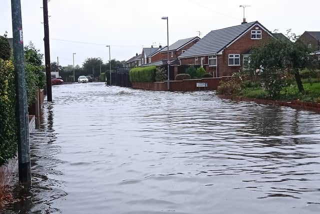 An image of Linkfield Drive under water