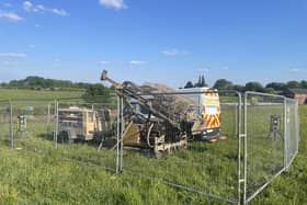 A drilling company is doing soil sampling work in a field off Scobell Street in Walshaw