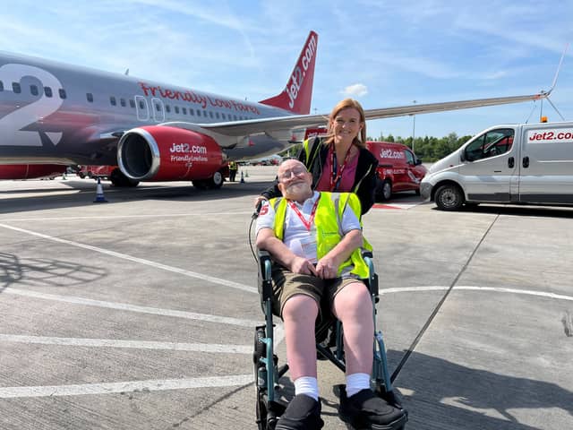 Bob and carer Sam Ion at Manchester Airport