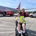 Bob and carer Sam Ion at Manchester Airport