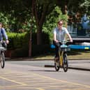Local democracy reporter Ethan Davies test rides the old and new E-bike in Manchester