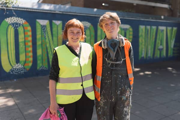 Tracey Cartledge and Oskar who helped create the mural at Prestwich tram stop