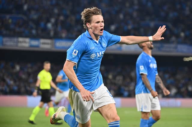 Scott McTominay celebrates scoring Napoli's first goal in the 2-0 win over Cagliari which clinched the Serie A title. (Photo by ISABELLA BONOTTO/AFP via Getty Images)