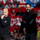 Pep Guardiola and Ruben Amorim stand on the sidelines during a match