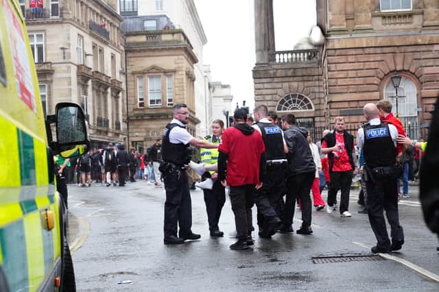 Police and emergency personnel dealing with the road traffic incident