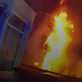 Dramatic moment massive house fire rages as police race to evacuate street.