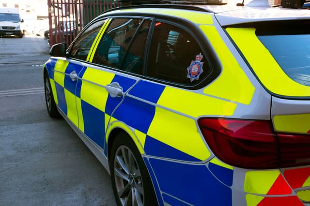 A Greater Manchester Police car