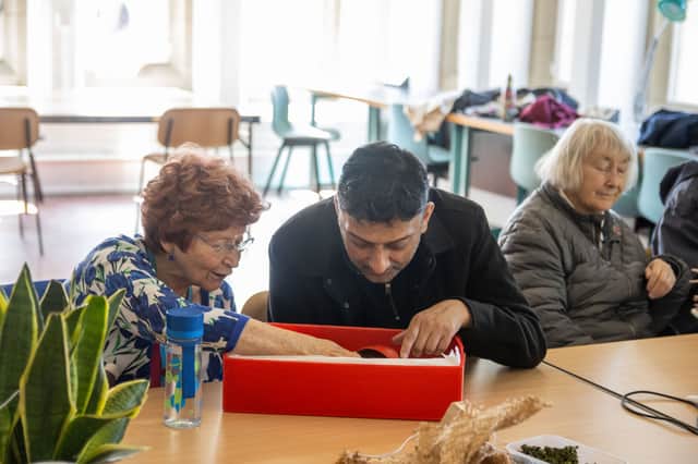 Mary and Azam during a workshop