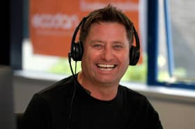 George Clarke answering calls at Mitsubishi Electric 