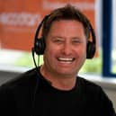 George Clarke answering calls at Mitsubishi Electric 