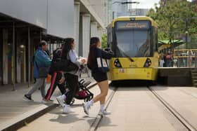 Andy Burnham said the tram-trains, able to operate both on tram tracks and existing rail lines, would be the key to unlocking Metrolink services to the towns.